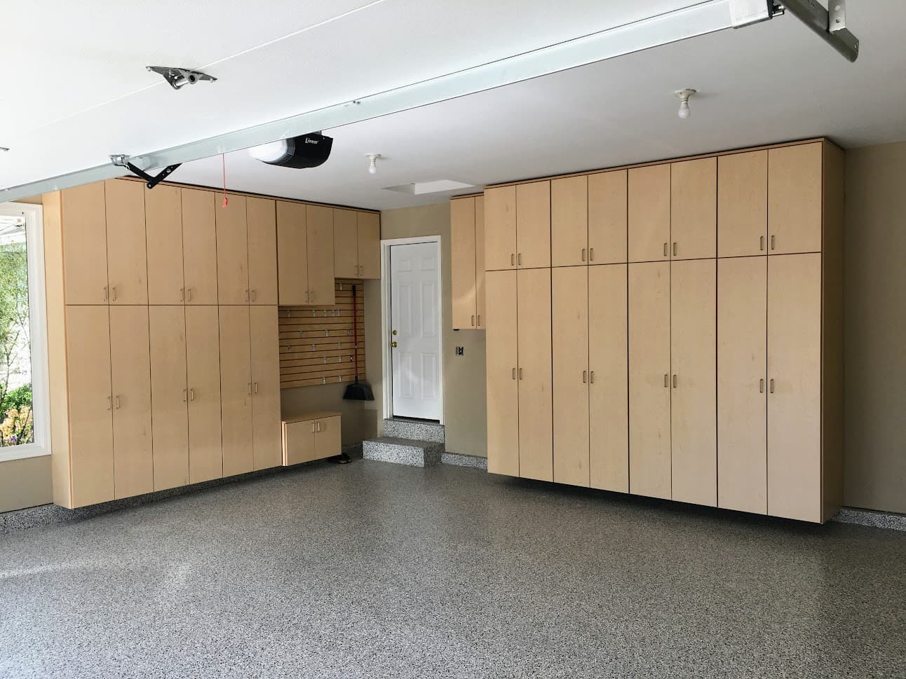 Brown garage cabinetry and workbench