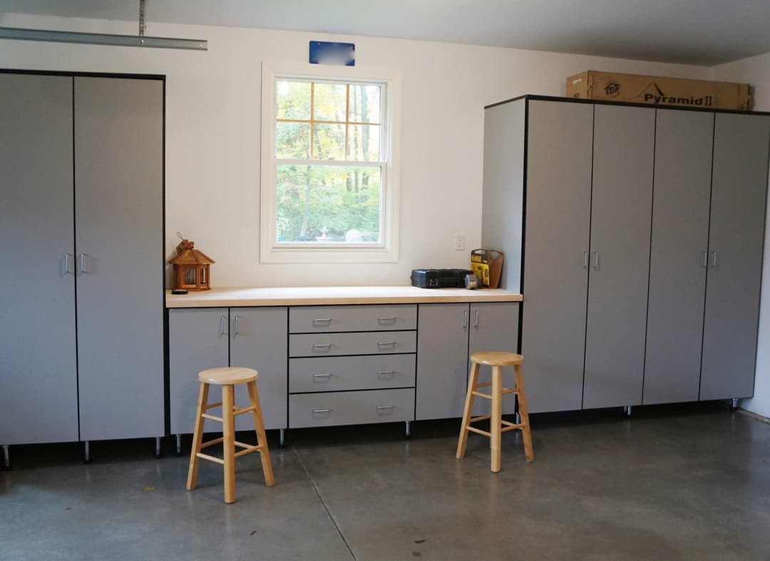 Grey garage with stools and workspace