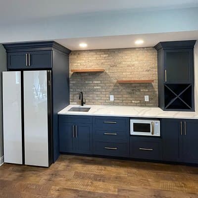 Murphy bed system with surrounding built-in shelving