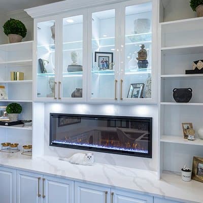 Custom walk-in closet with built-in shelving and hanging sections