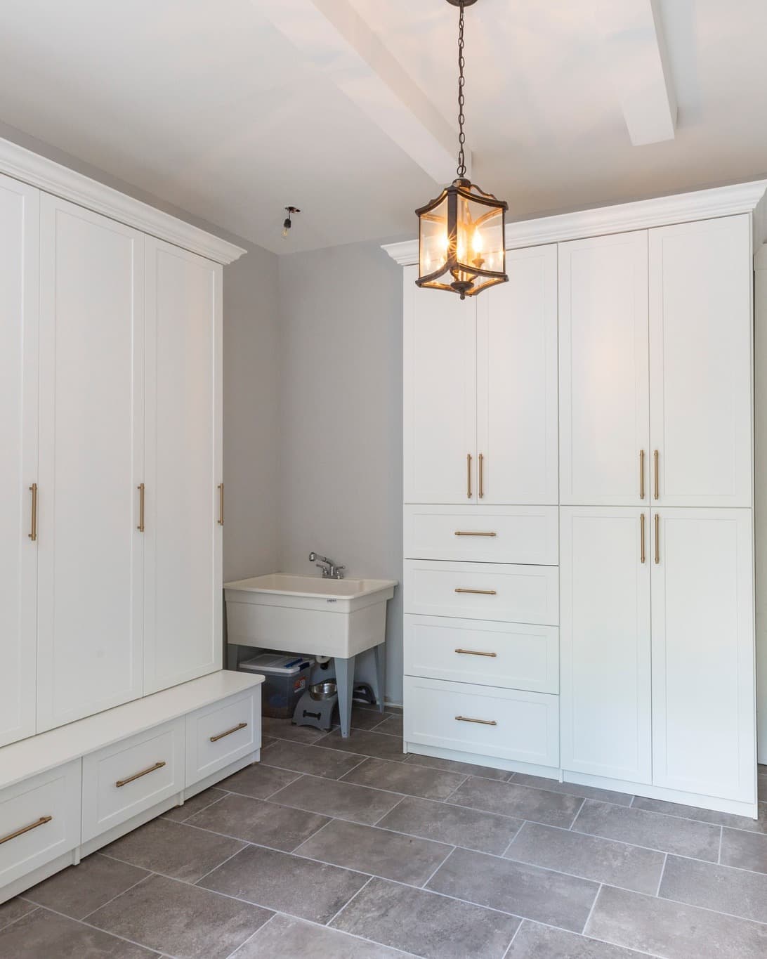 White laundry room storage system